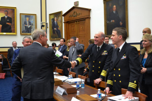 Rep. Joe Wilson, R-S.C., greats Vice Adm. Matthew Nathan, Navy surgeon general, at a hearing on mental health research in the military as Lt. Gen. Thomas Travis, Air Force surgeon general (far left), and Cmdr. Russell Carr M.D., of the Walter Reed National Military Medical Center (far right), look on.