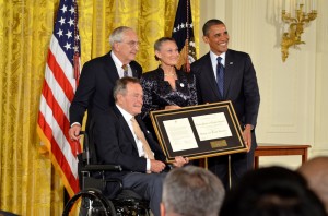 President George H.W. Bush, far left, awarded Floyd Hammer and Kathy Hamilton of Union, IA the 5,000th Daily Point of Light Award with President Barack Obama at the White House Monday.