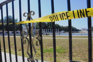 Caution tape and barricades separated visitors from the World War II memorial, but Honor Flight veterans entered the memorial, even though the National Mall is closed during the government shutdown. (Elena Schneider/Medill News Service)