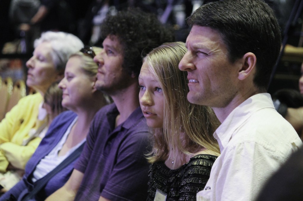 Isabella's parents, younger sister and relatives came to Washington to cheer her on. They watch others compete before Isabella takes her spot on stage. (Homa Bash/MEDILL)