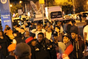 Demonstrators protesting the death of Baltimore resident Freddie Gray occupied the intersection of Pennsylvania and West North avenues Tuesday night. Photo by Matthew Schehl.