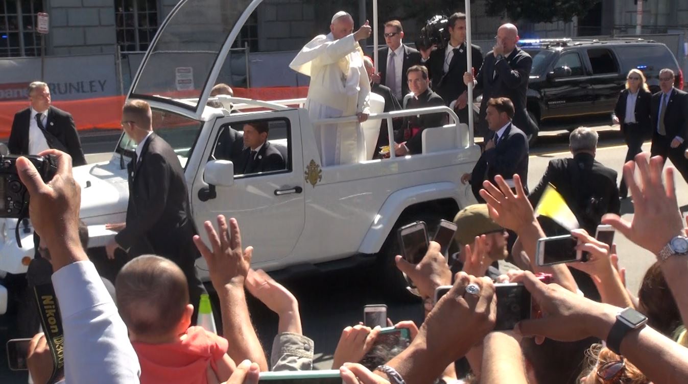 Pope pleases passersby