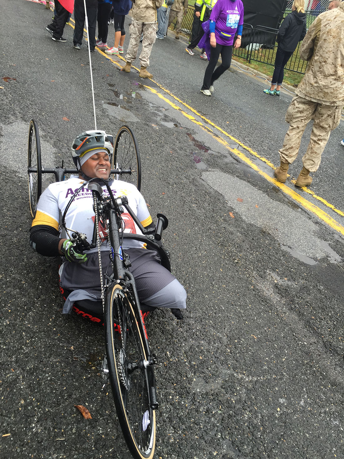 Injured Marine veteran rolls to finish line at Washington, DC, marathon