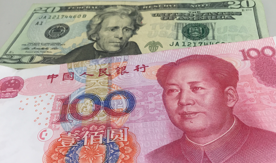 China will let yuan weaken further as dollar rises, analysts say