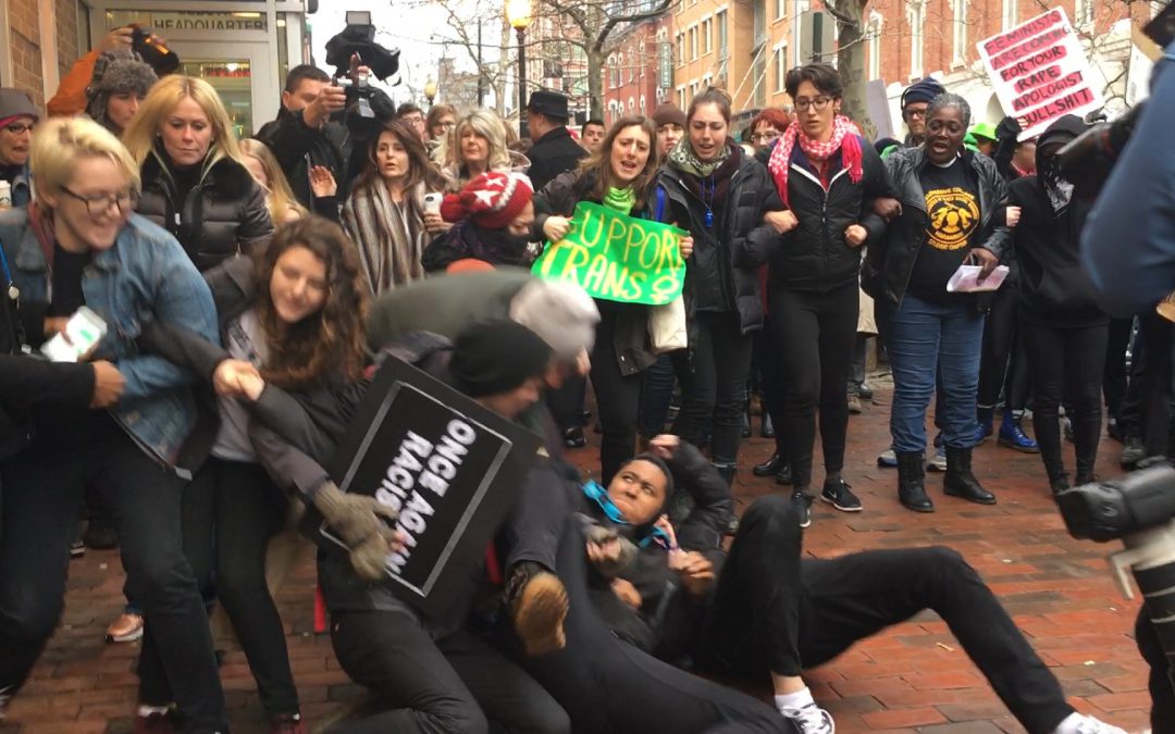 Protesters make a human wall (video)