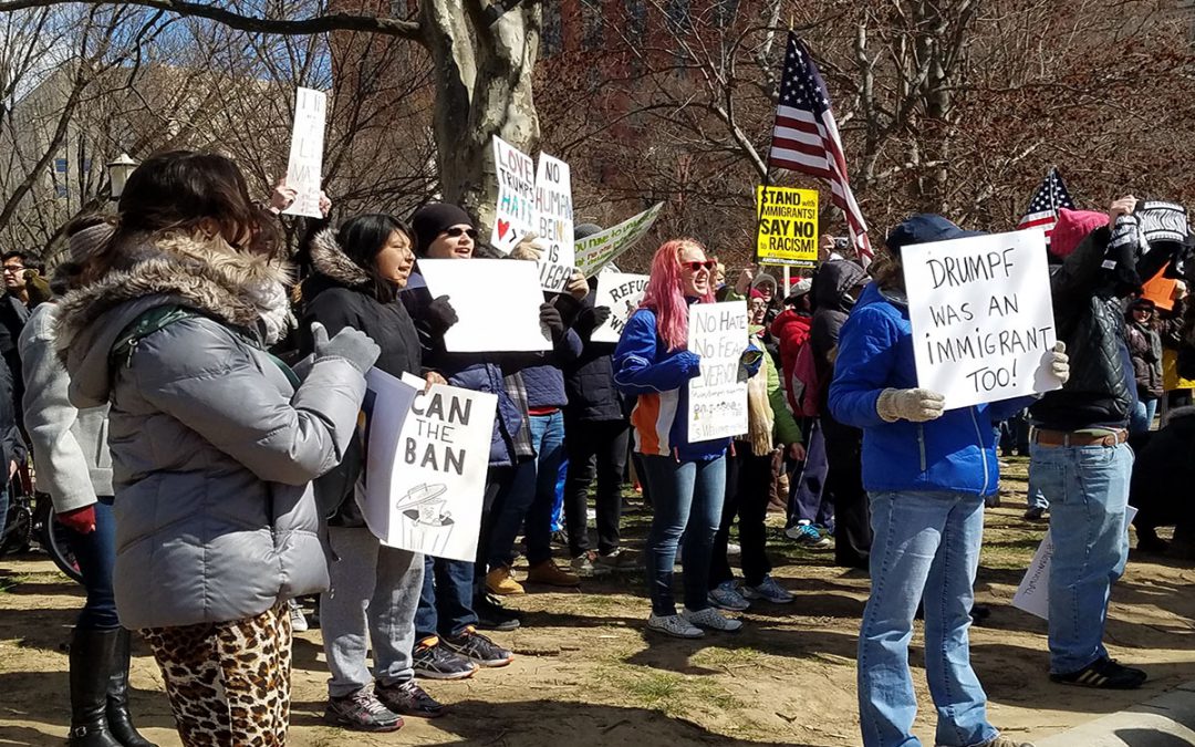 Demonstrators protest Trump travel ban despite frigid weather