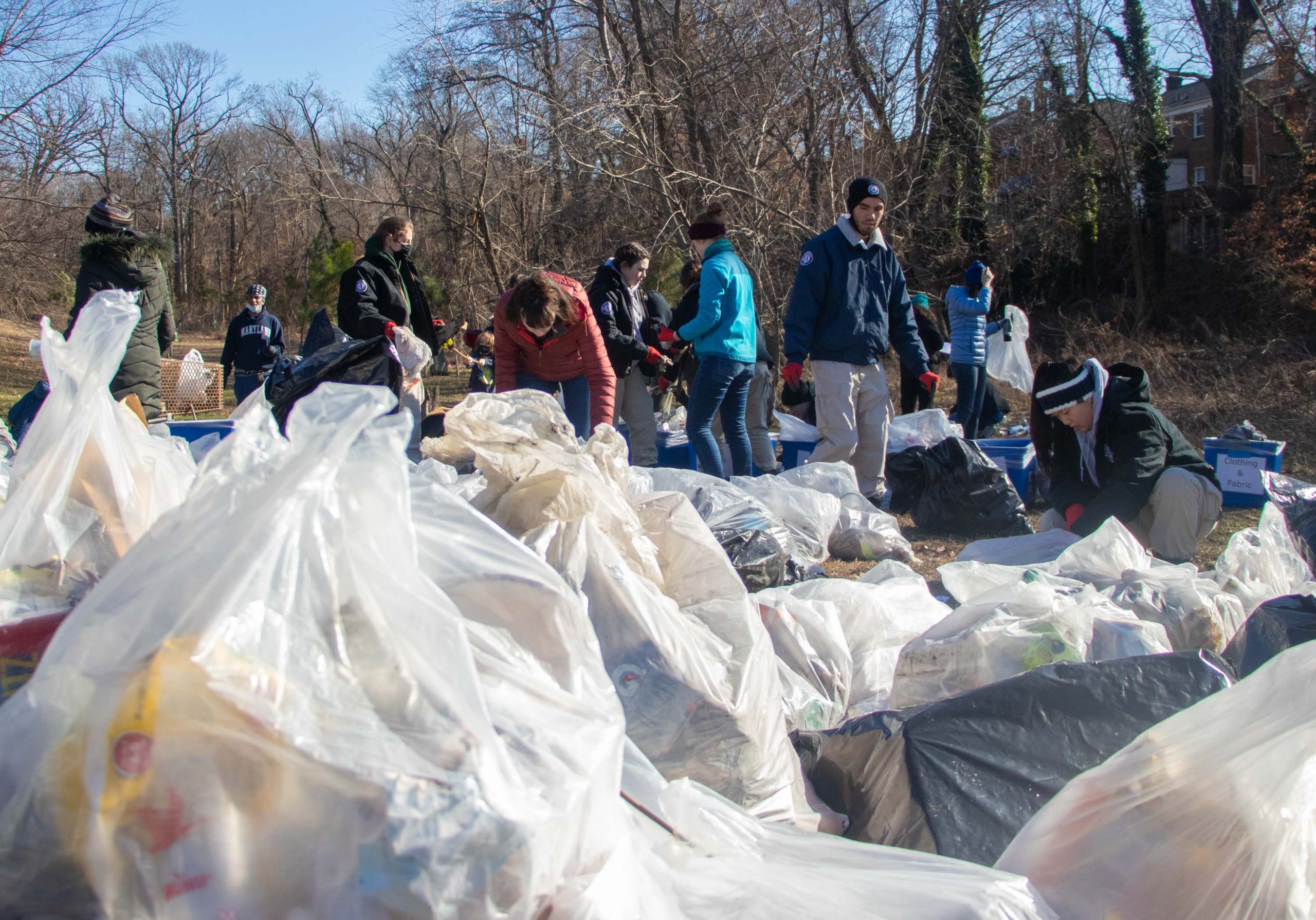 Bags of trash collected by volunteers sit before being sorted by volunteers. (Isabel Miller |  Medill News Service)
